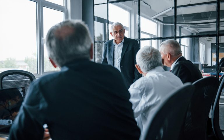 aged-team-of-elderly-businessman-architects-have-a-2021-08-28-22-30-31-utc