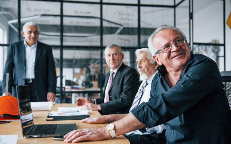aged-team-of-elderly-businessman-architects-have-a-2021-08-28-22-30-33-utc